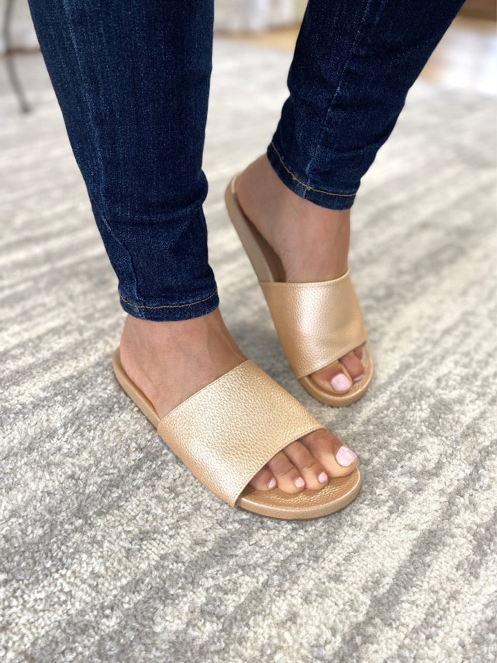 The Backyard Slides in Gold