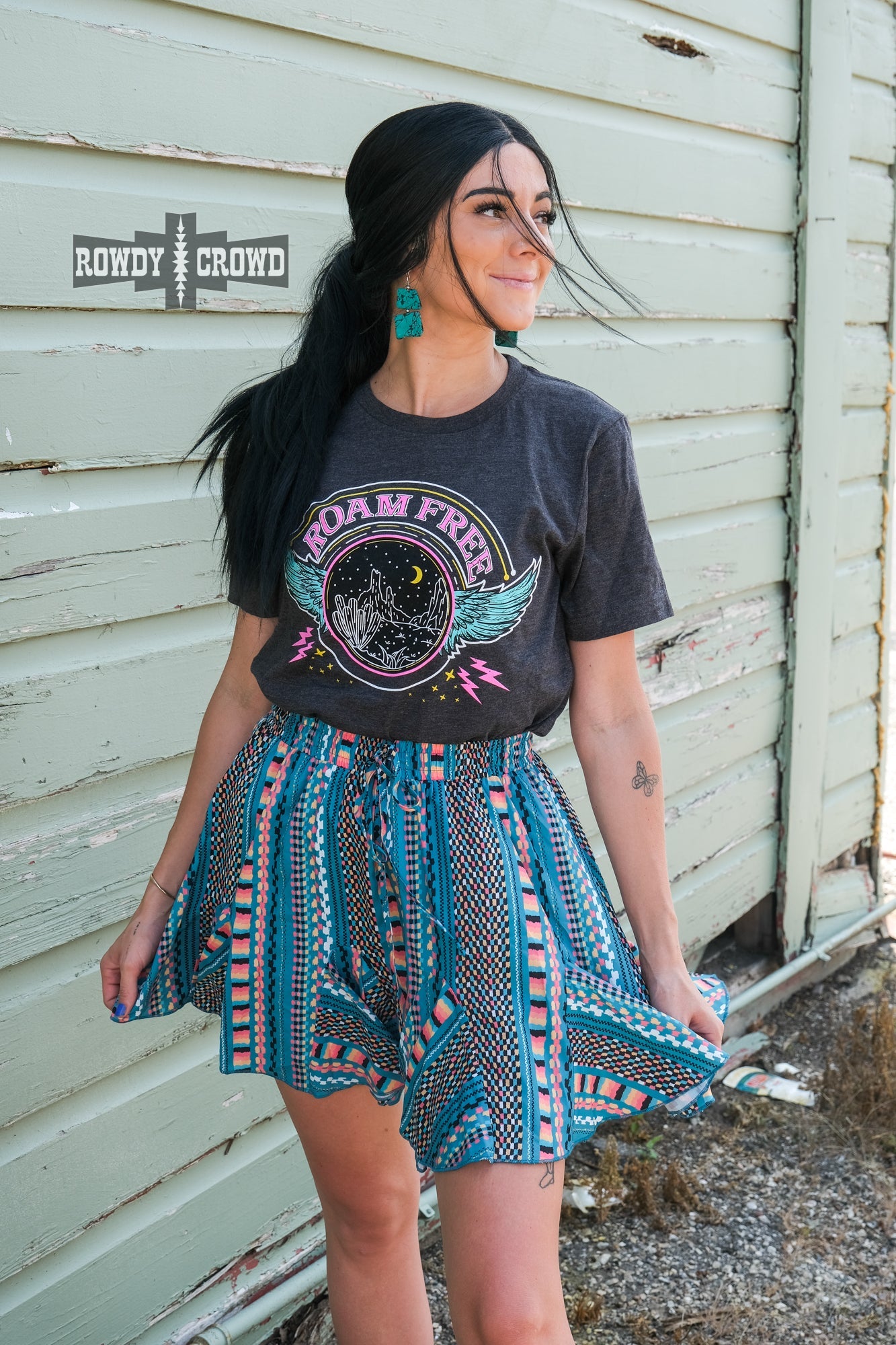 western apparel, western graphic tee, graphic western tees, wholesale clothing, western wholesale, women's western graphic tees, wholesale clothing and jewelry, western boutique clothing, western women's graphic tee, band style graphic tee, desert scene graphic tee, cactus, desert scene, bright graphic tee, colorful graphic tee, neon graphic tee, colorful western graphic tee, western desert scene graphic tee, roam free, band tee inspired