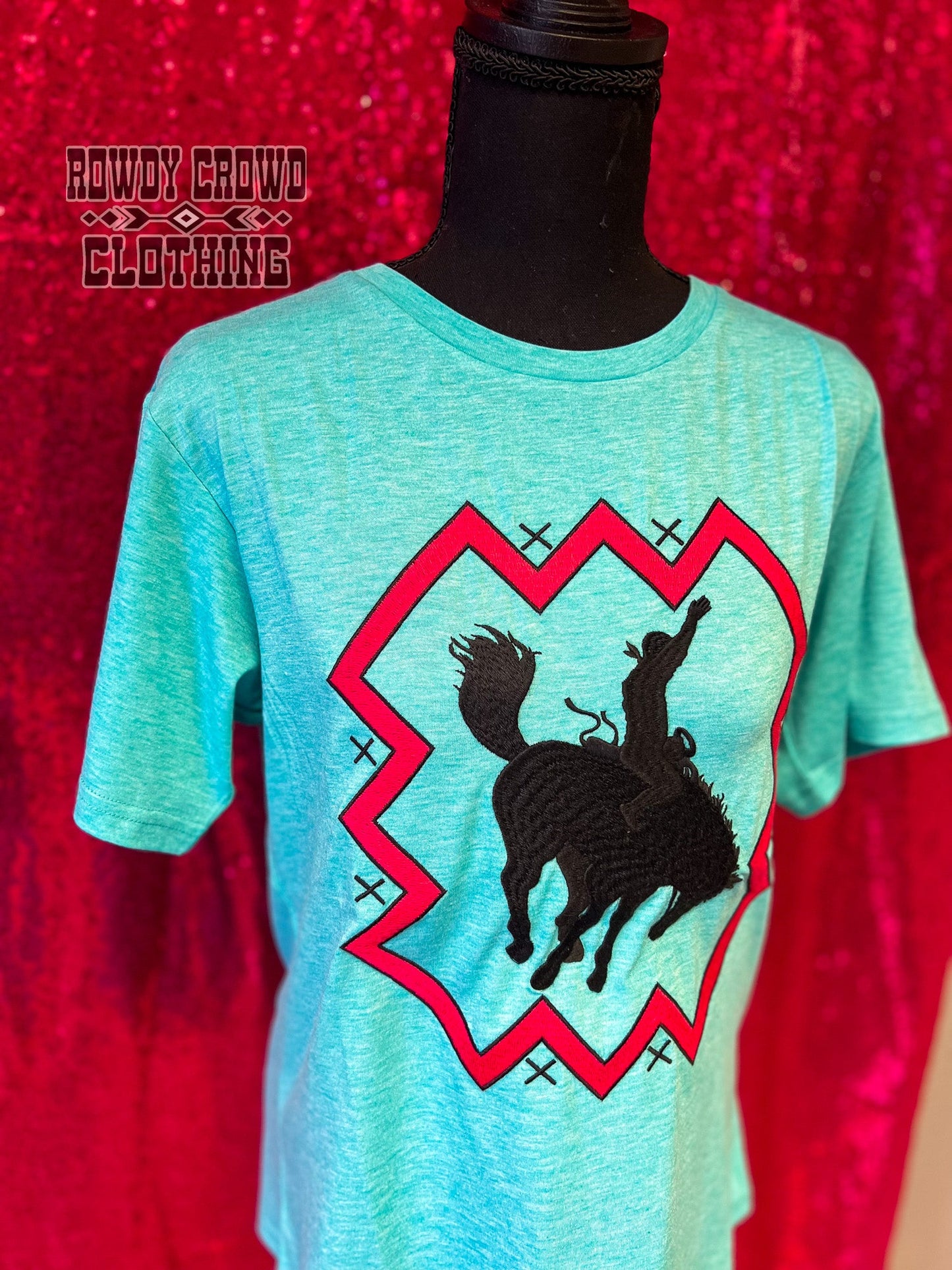 womens apparel, womens western tops, western tops, western apparel, western attire, embroidered tops, southwestern tops, southwestern style, womens western fashion, western wholesale, wholesale clothing and accessories wholesale clothing, western wholesale clothing, bronc, bronc riding, bronc tee, bronc riding tee