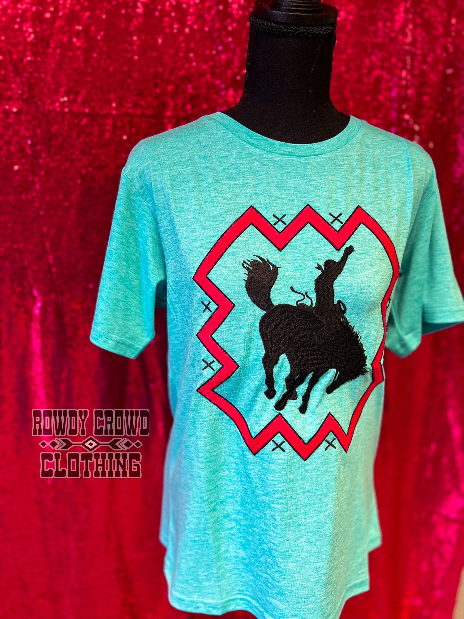 womens apparel, womens western tops, western tops, western apparel, western attire, embroidered tops, southwestern tops, southwestern style, womens western fashion, western wholesale, wholesale clothing and accessories wholesale clothing, western wholesale clothing, bronc, bronc riding, bronc tee, bronc riding tee